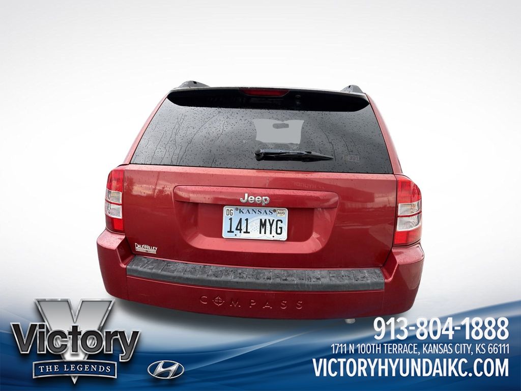 Used 2010 Red Jeep Sport image 6