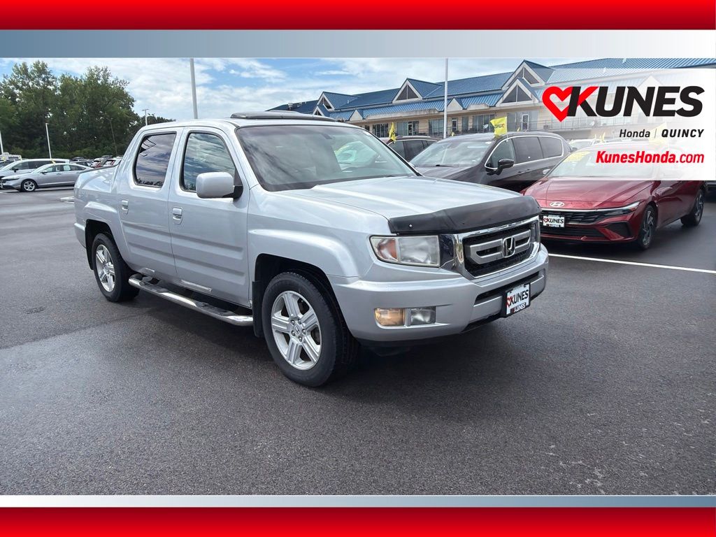 Silver 2009 Honda Ridgeline Pickup Truck Four-Wheel Drive 5-Speed Automatic