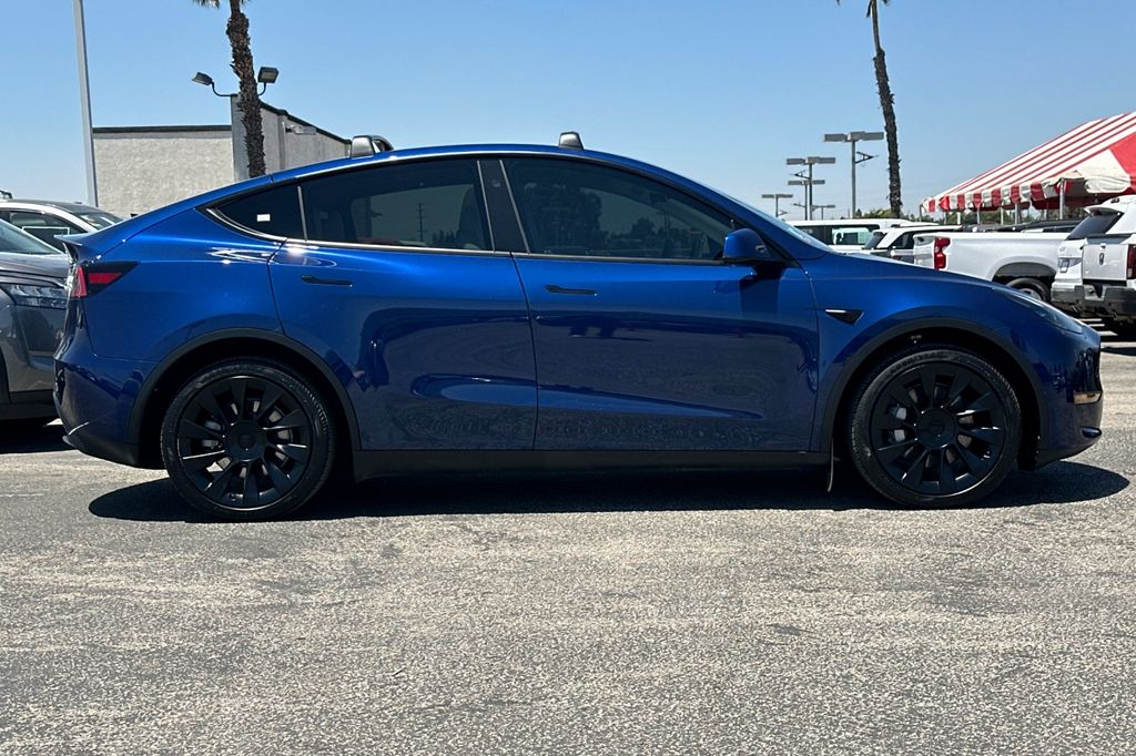 Used 2024 Tesla Model Y Long Range with VIN 7SAYGDEE9RF069040 for sale in San Bernardino, CA