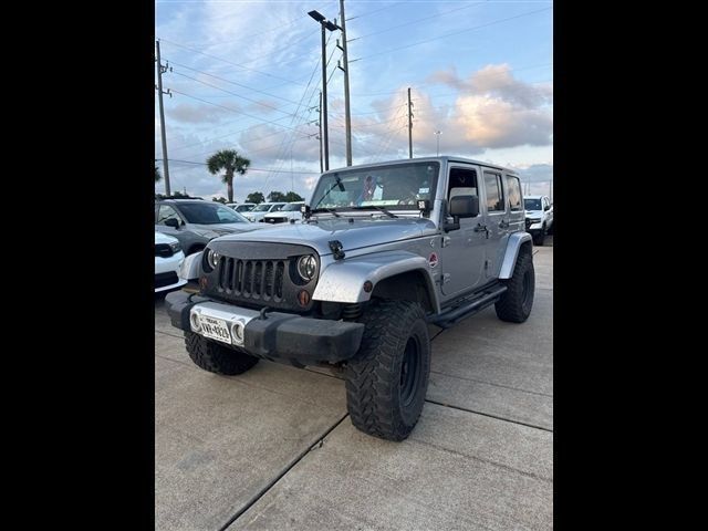2013 Jeep Wrangler Unlimited Sahara Silver at Emmons Autoplex
