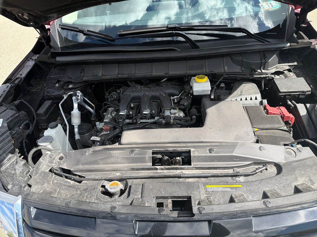 2025 Nissan Pathfinder SL Red at John Sisson Motors