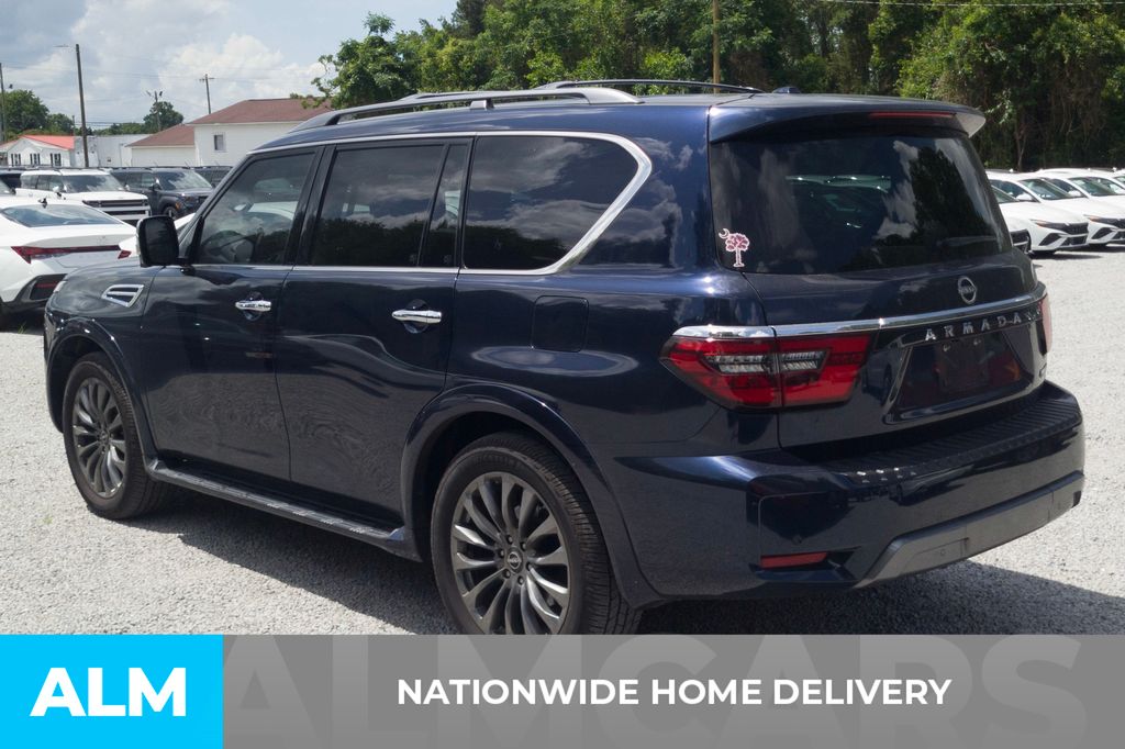Used 2023 Blue Pearl Nissan Platinum image 4