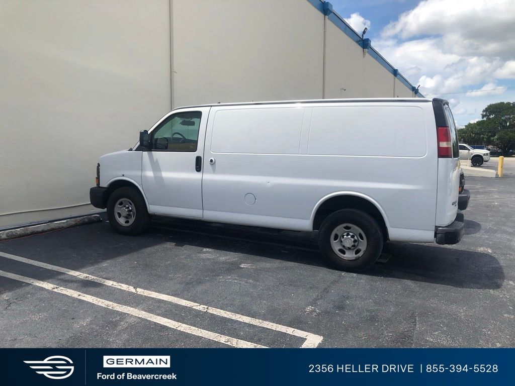 Used 2013 White Chevrolet Work Van image 2
