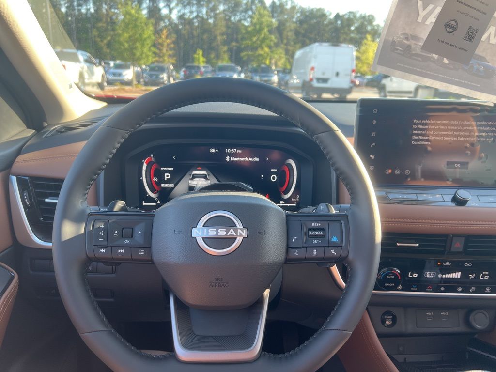 2025 Scarlet Ember Tintcoat Nissan Rogue Platinum FWD SUV