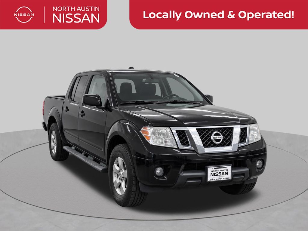 2012 Nissan Frontier Negro (Super Black Metallic) Camioneta 4X2 5 velocidades Automática marcha alta