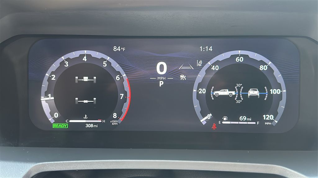2026 Toyota Tacoma Hybrid Limited Red at EAG Ford Navasota
