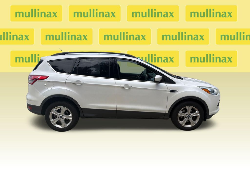 Used 2016 Ford Escape SE with VIN 1FMCU0GX7GUC50886 for sale in New Smyrna Beach, FL