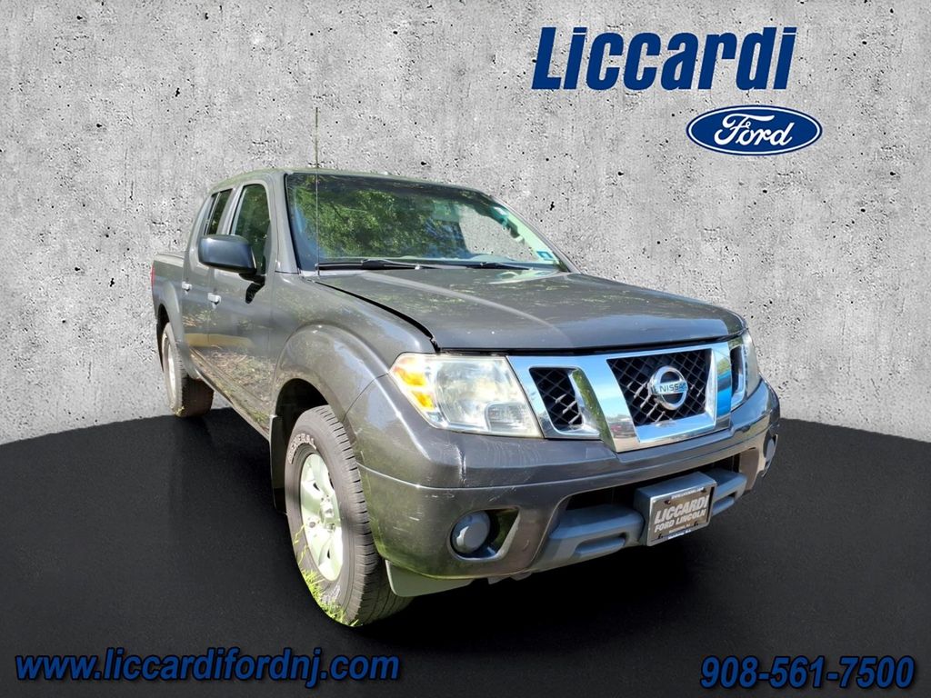2012 Nissan Frontier Night Armor Pearl/Mica Camioneta Todo terreno 5 velocidades Automática marcha alta
