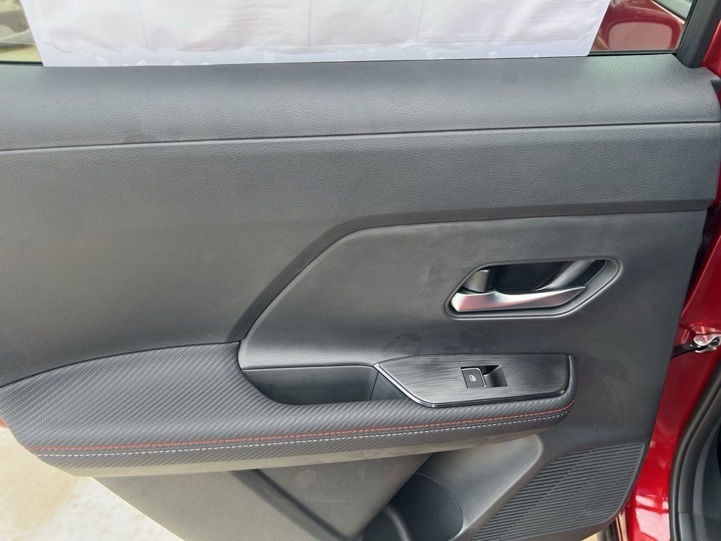 2025 Scarlet Ember Tintcoat Nissan Kicks SR FWD SUV