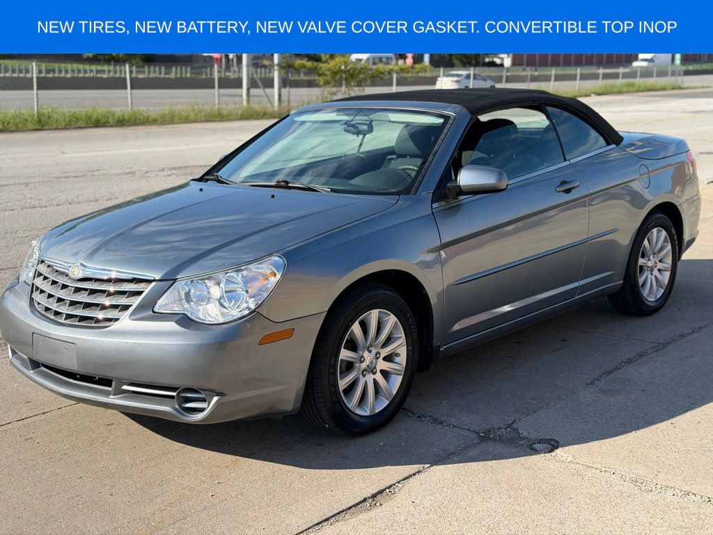Silver Steel Metallic Clearcoat/Black Vinyl Top 2010 Chrysler Sebring Touring Convertible FWD Convertible Front-Wheel Drive 4-Speed Automatic