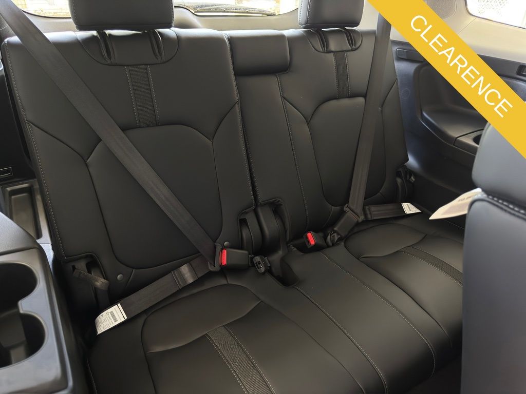 2025 Honda Pilot Touring Red at AutoSavvy Houston Northwest