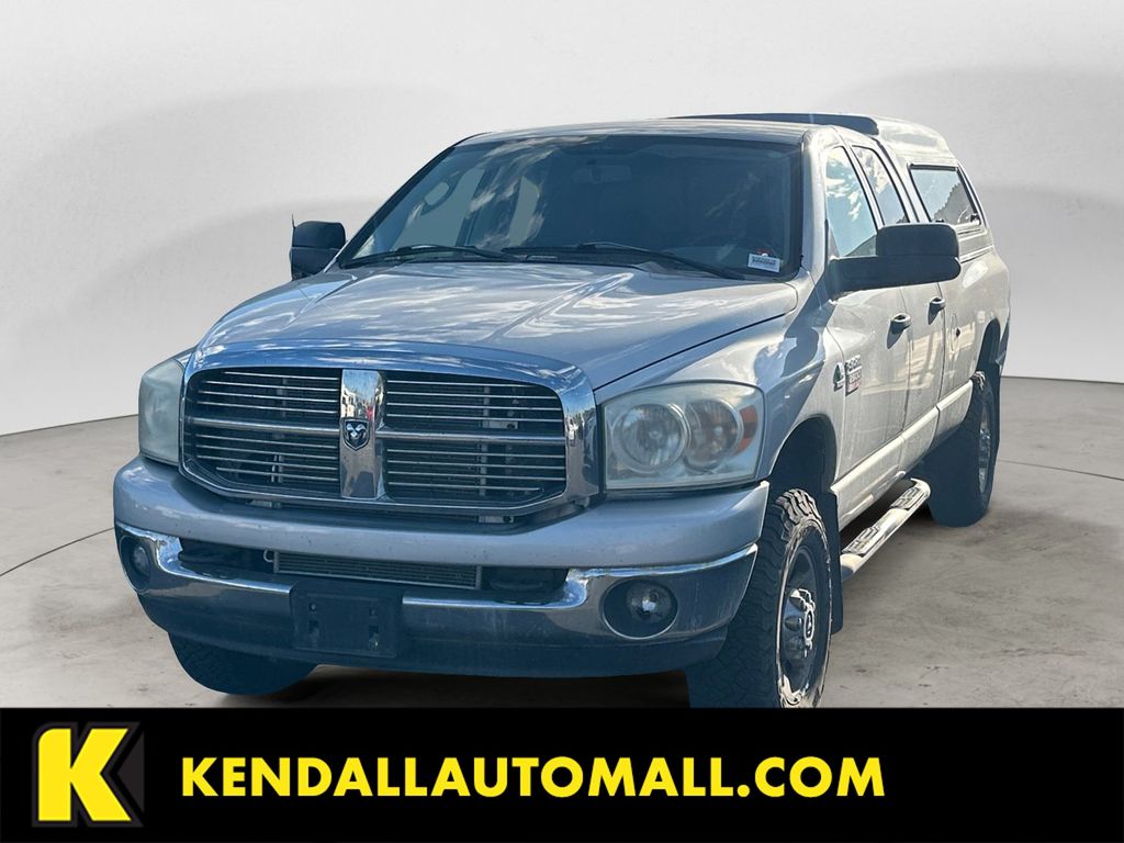 Bright Silver Clearcoat Metallic 2009 Dodge RAM 2500 SLT Quad Cab 4WD Pickup Truck Four-Wheel Drive 6-Speed Automatic