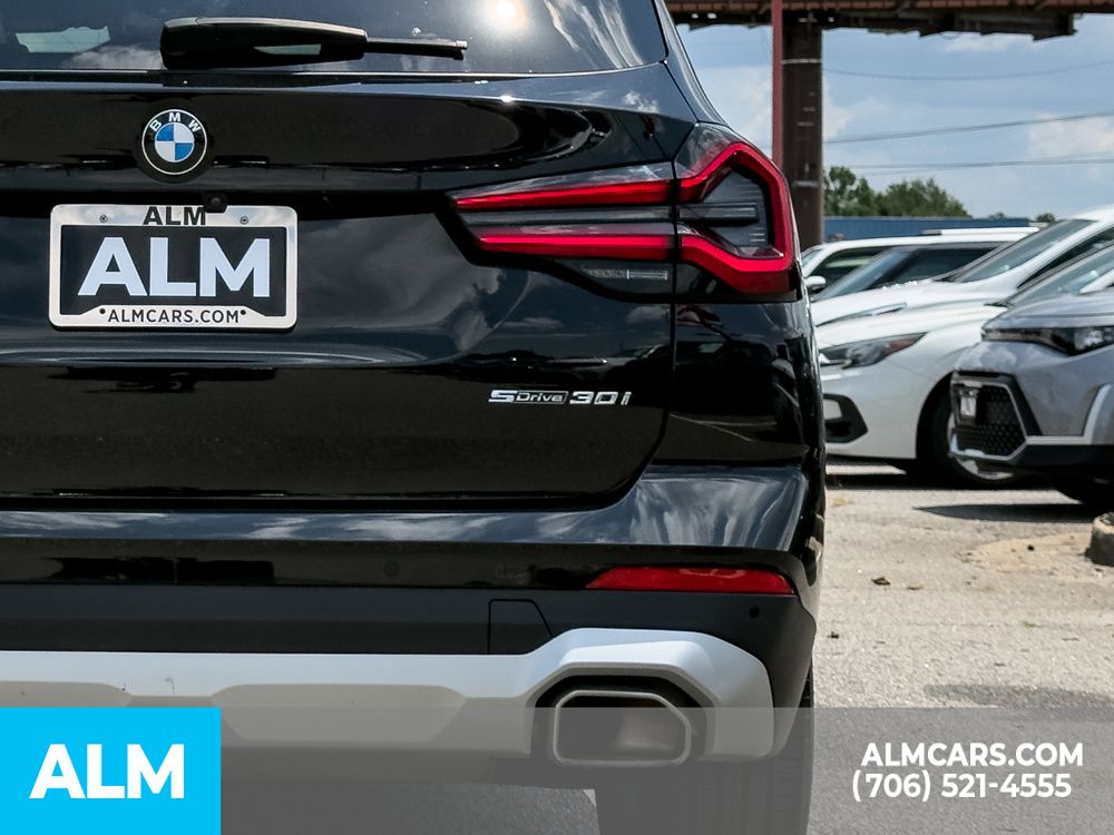 Used 2024 Black BMW sDrive30i image 6