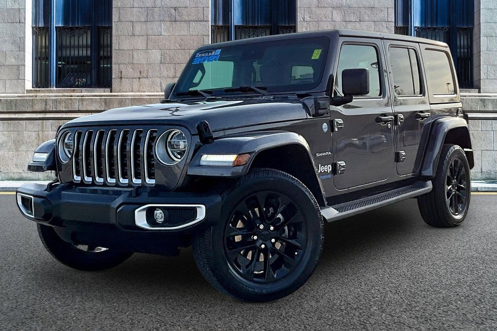 Used 2021 Jeep Wrangler Unlimited Sahara 4XE with VIN 1C4JJXP6XMW702950 for sale in North Riverside, IL