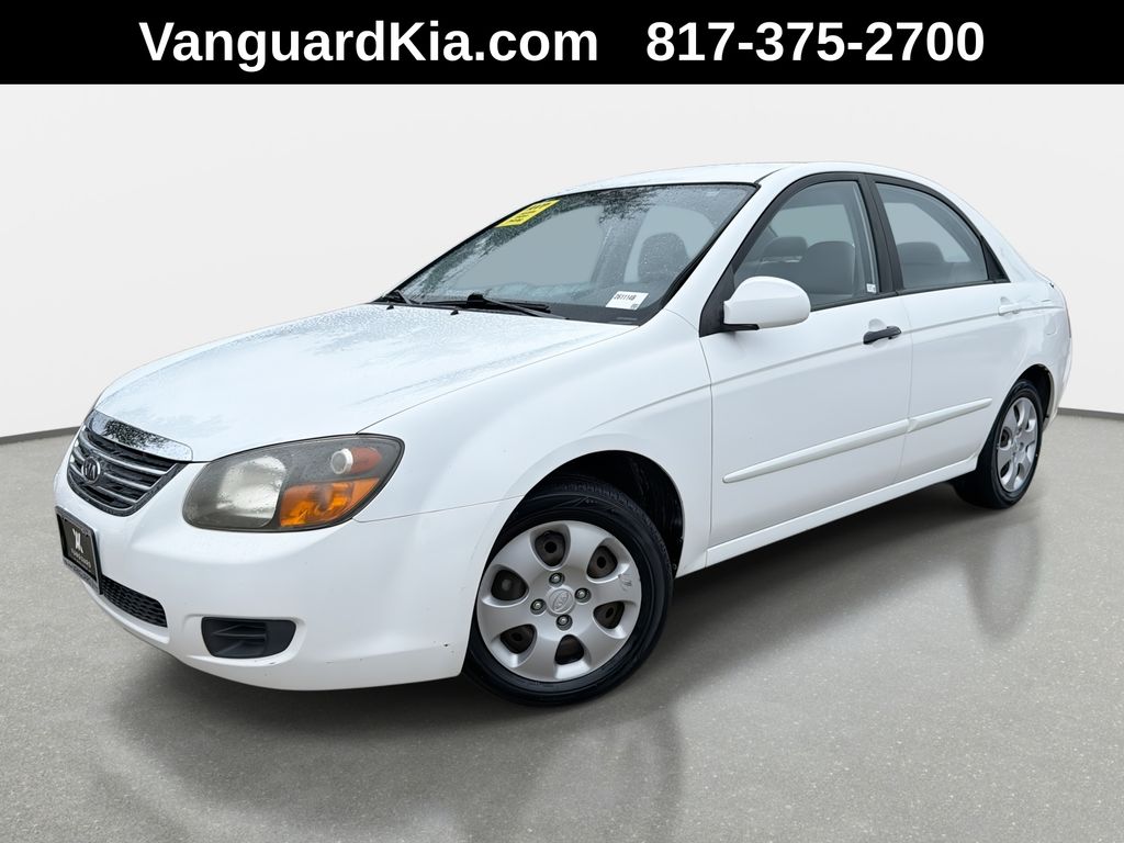 Clear White 2009 Kia Spectra LX Sedan Front-Wheel Drive 4-Speed Automatic Overdrive