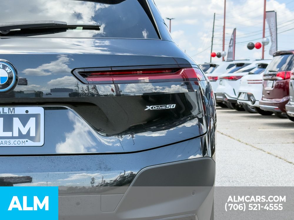 Used 2024 Black BMW xDrive50 image 9
