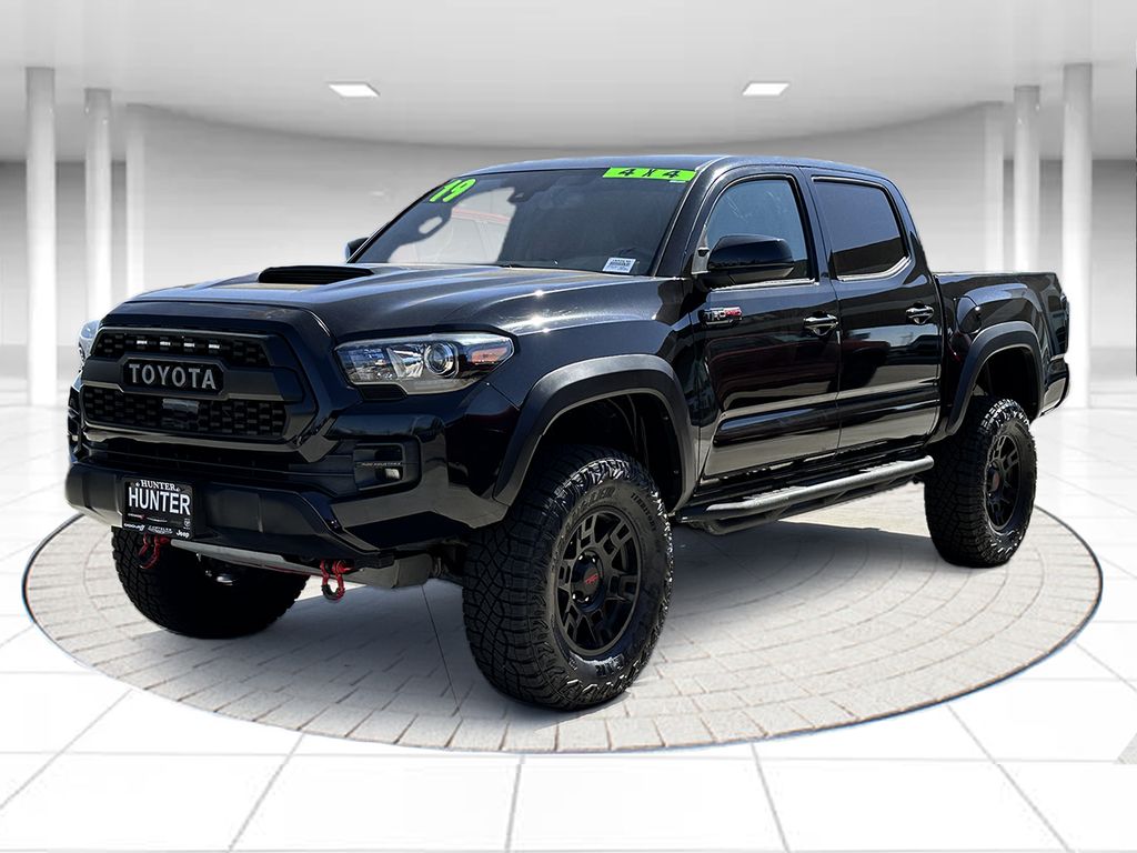 Midnight Black Metallic 2019 Toyota Tacoma Pickup Truck Four-Wheel Drive 6-Speed Automatic