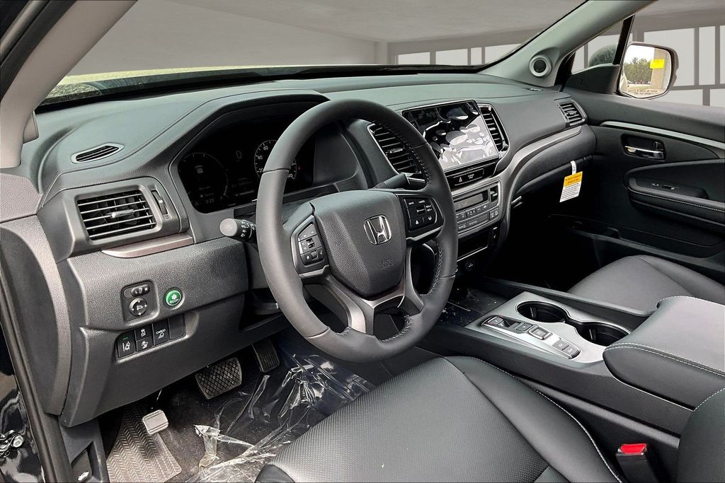 View vehicle photo 7