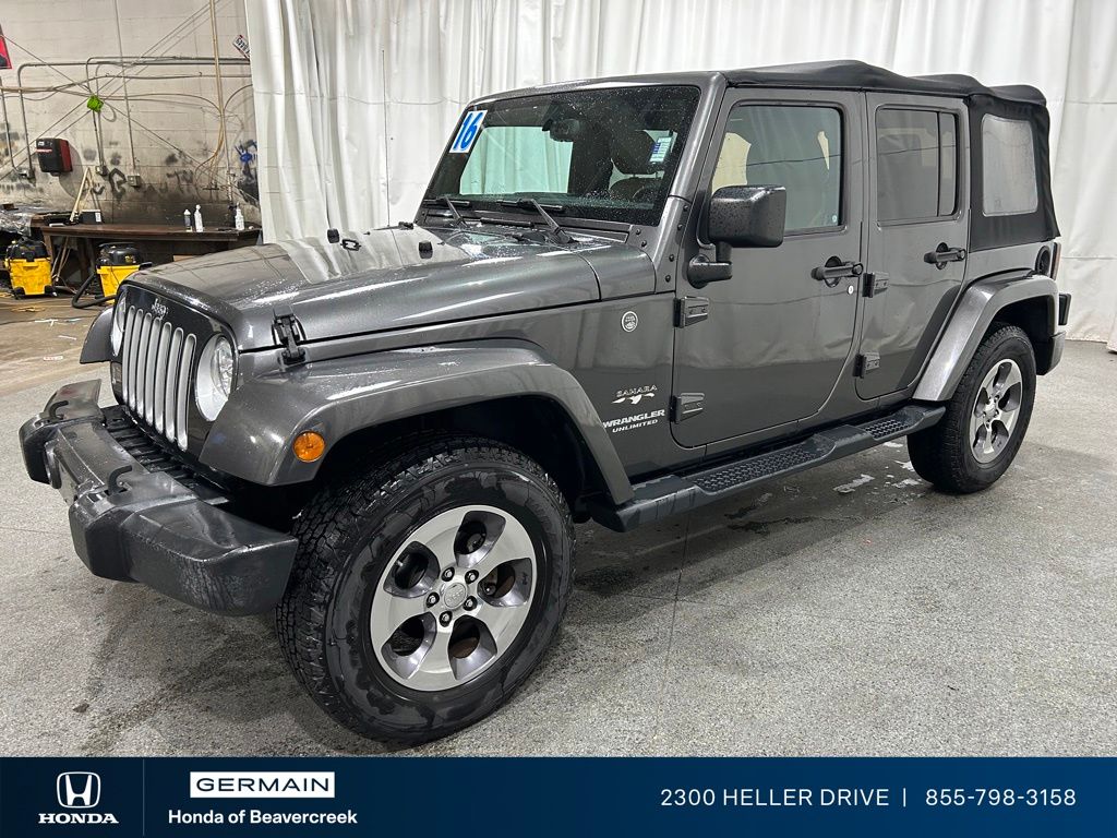 Used 2016 Gray Jeep Unlimited Sahara image 4