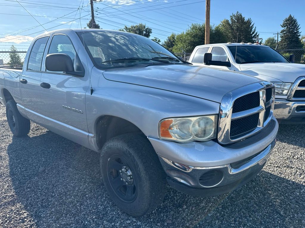 Silver 2004 Dodge RAM 1500 Pickup Truck Four-Wheel Drive 5-Speed Automatic