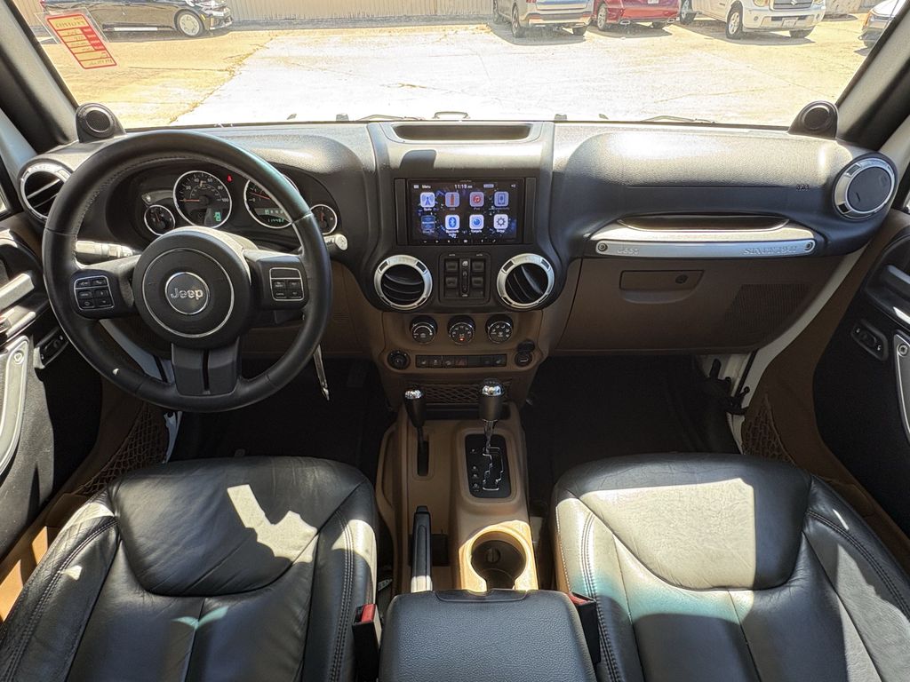 2014 Jeep Wrangler Unlimited Sahara White at Autostrade