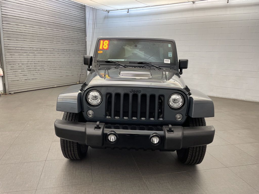 Used 2018 Black Jeep Unlimited Sahara image 9