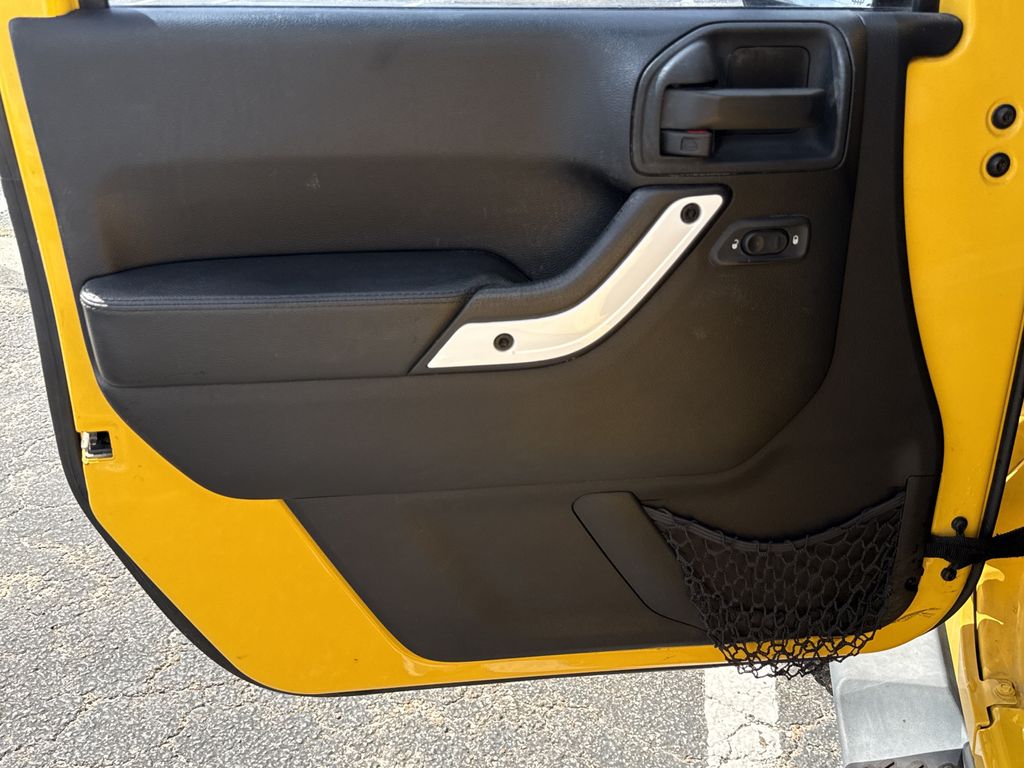 2015 Jeep Wrangler Unlimited Sahara Yellow at Parkway Family Mazda
