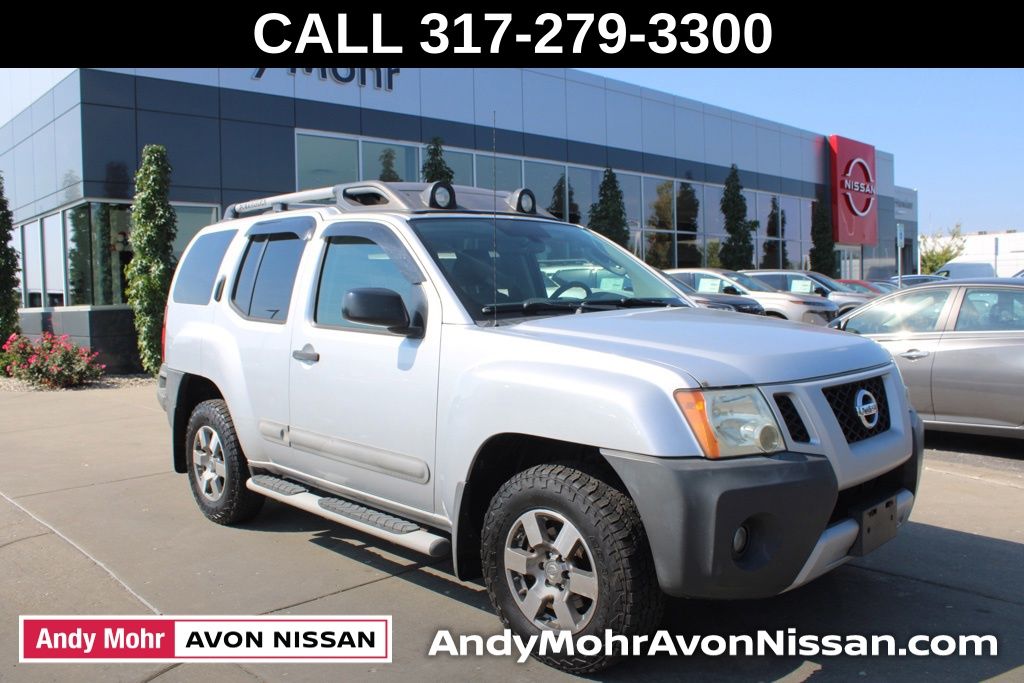 Silver Lightning Metallic 2011 Nissan Xterra SUV / Crossover  5-Speed Automatic