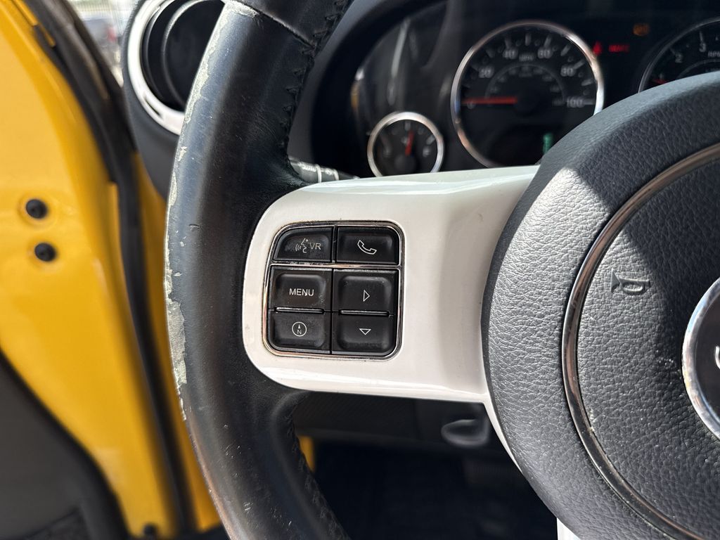 2015 Jeep Wrangler Unlimited Sahara Yellow at Parkway Family Mazda