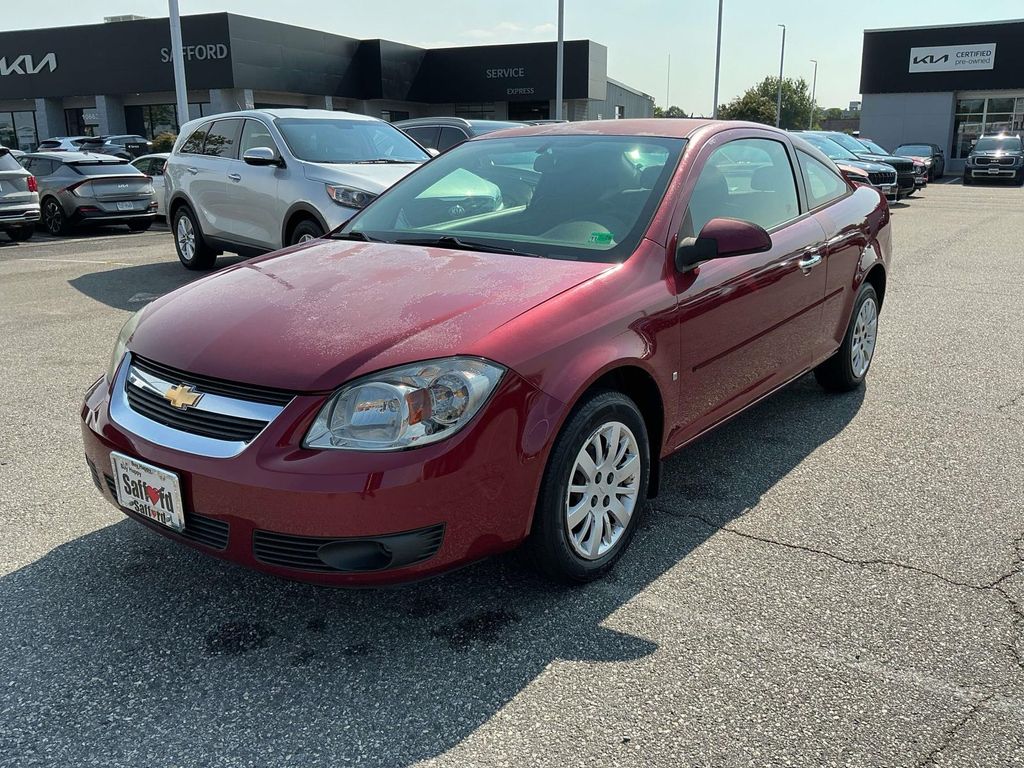 Sport Red Tint 2009 Chevrolet Cobalt Coupe Front-Wheel Drive 5-Speed Manual