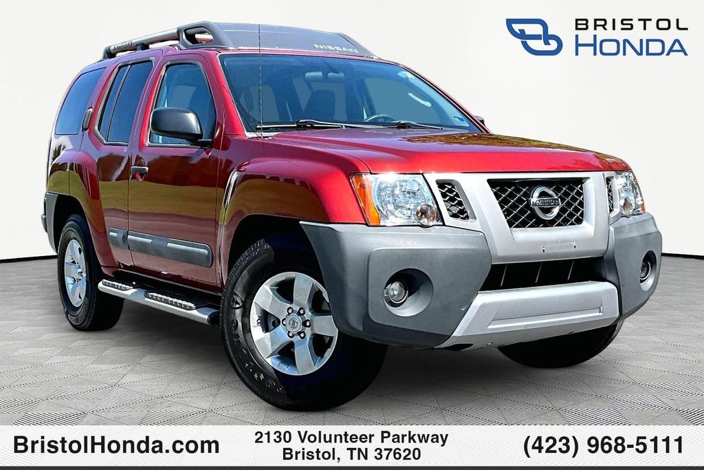 Lava Red Pearl-Mica/Metallic 2011 Nissan Xterra SUV / Crossover 4X2 5-Speed Automatic