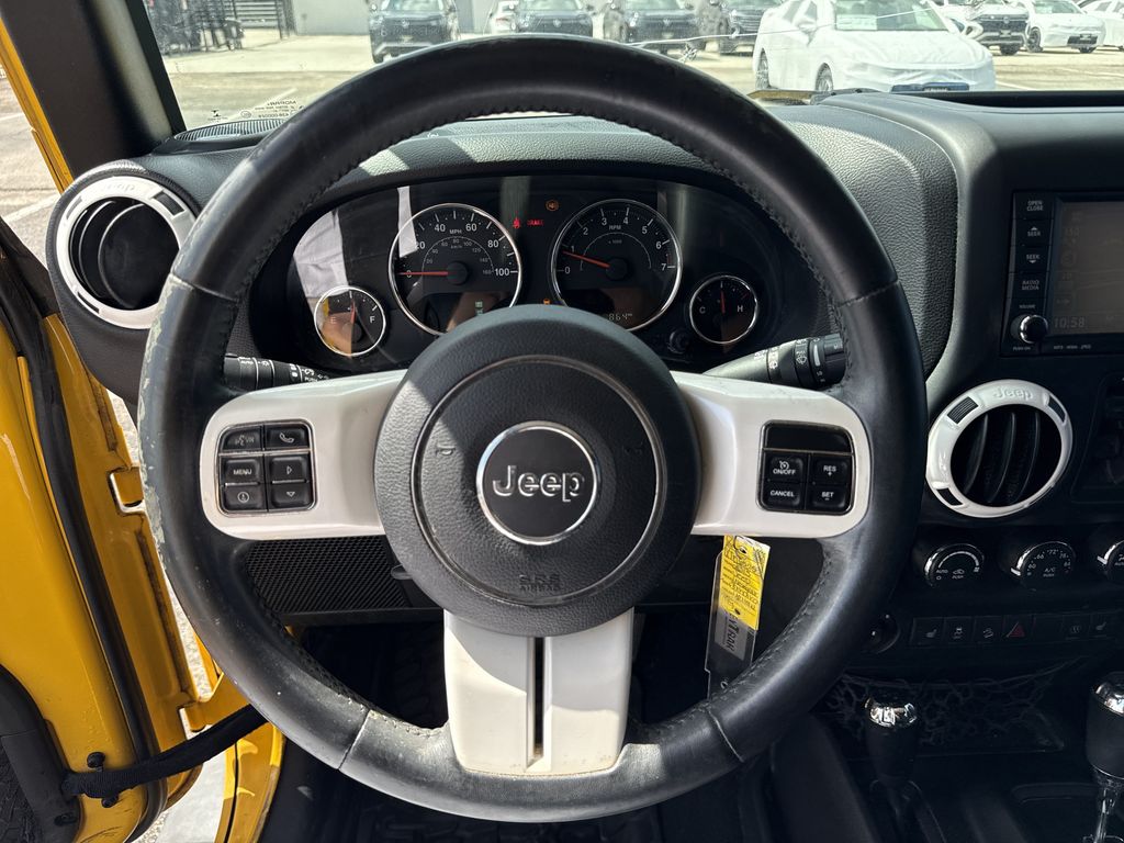 2015 Jeep Wrangler Unlimited Sahara Yellow at Parkway Family Mazda