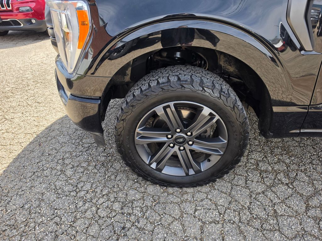 View vehicle photo 3