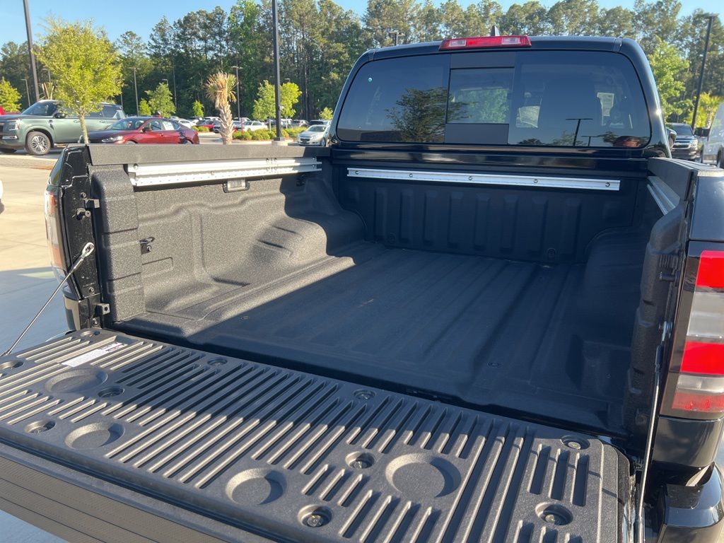 2025 Super Black Nissan Frontier SL RWD Truck