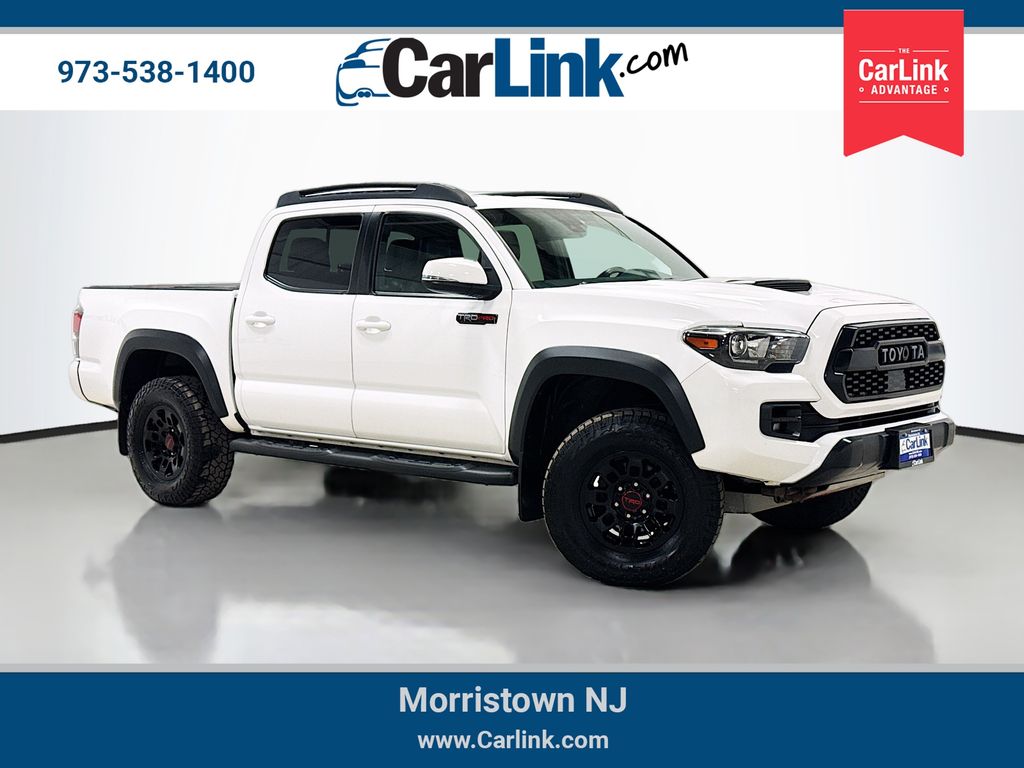 Super White 2019 Toyota Tacoma Pickup Truck Four-Wheel Drive 6-Speed Automatic