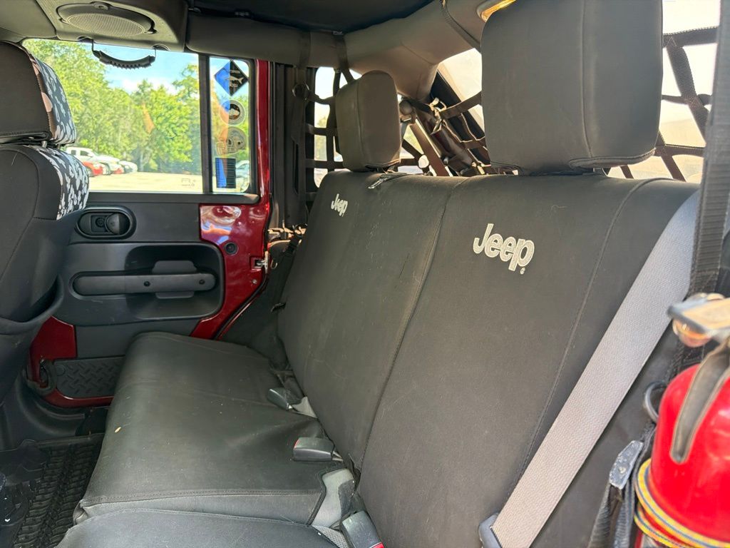 Used 2008 Red Jeep Unlimited Sahara image 11