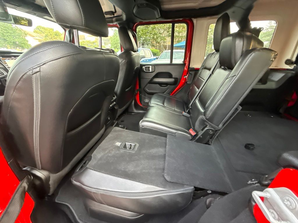 Used 2018 Red Jeep Unlimited Sahara image 13