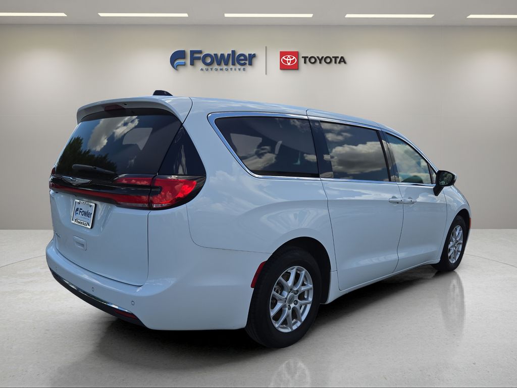 View vehicle photo 3