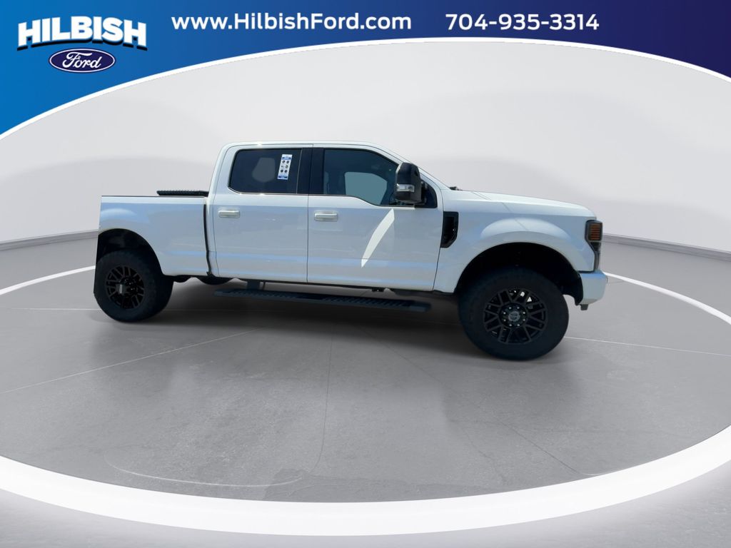 Used 2021 White Metallic Ford Lariat image 9