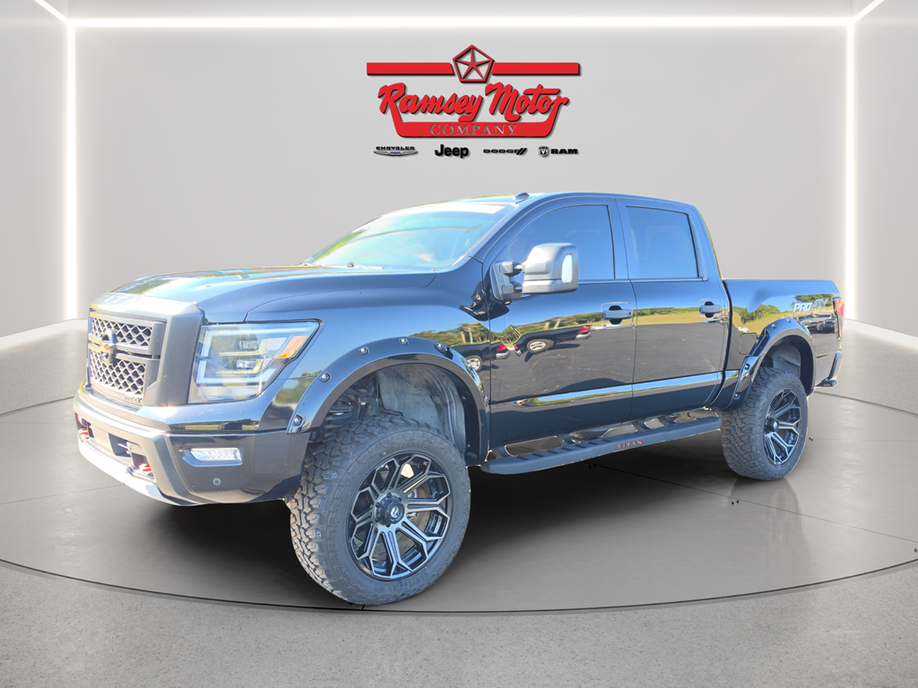 Super Black 2021 Nissan Titan Pickup Truck Four-Wheel Drive 9-Speed Automatic