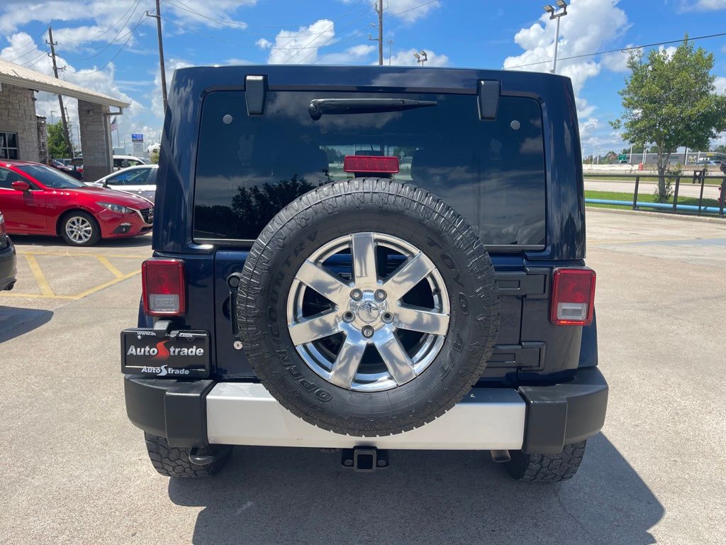 2013 Jeep Wrangler Unlimited Sahara Blue at Emmons Autoplex