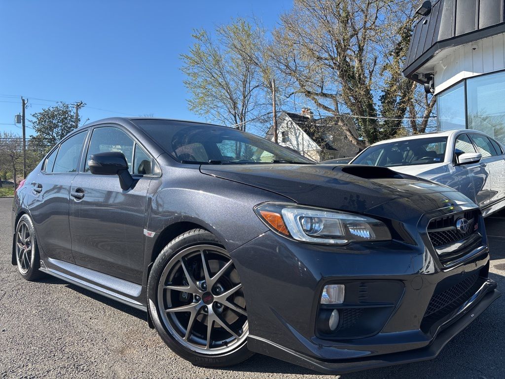 Dark Gray Metallic 2016 Subaru WRX STI Limited with Low Profile Spoiler Sedan All-Wheel Drive 6-Speed Manual