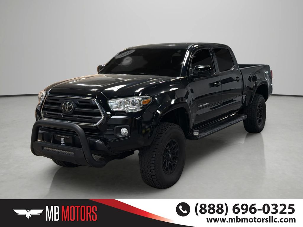 Midnight Black Metallic 2019 Toyota Tacoma Pickup Truck Four-Wheel Drive 6-Speed Automatic