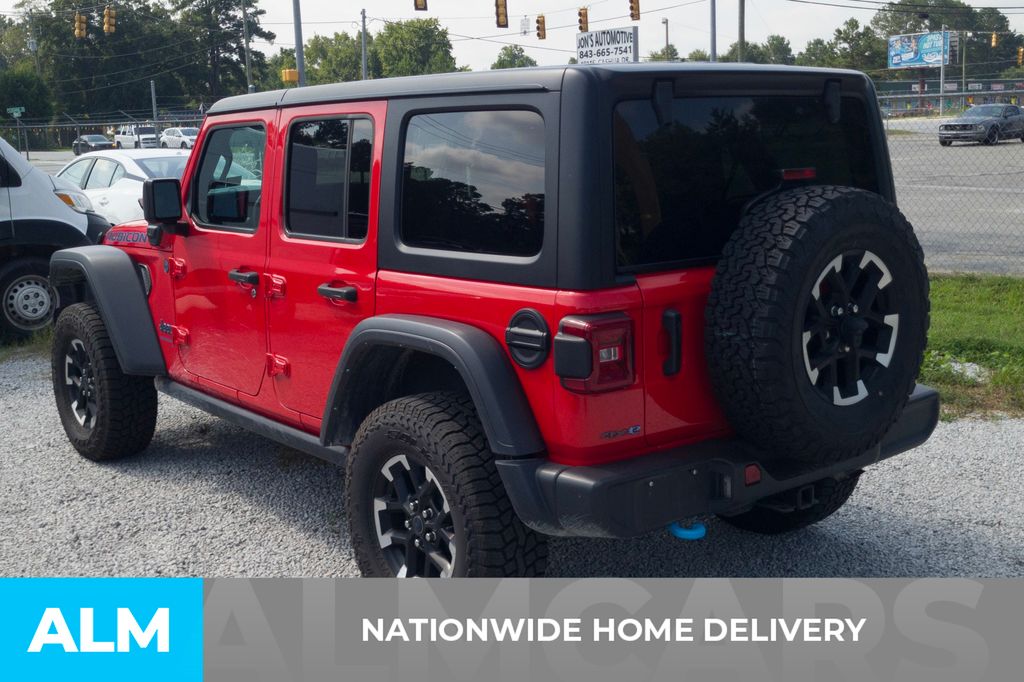 Used 2024 Red Jeep Rubicon 4xe image 4