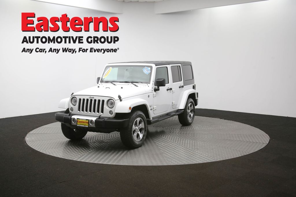 Used 2018 White Jeep Unlimited Sahara image 53