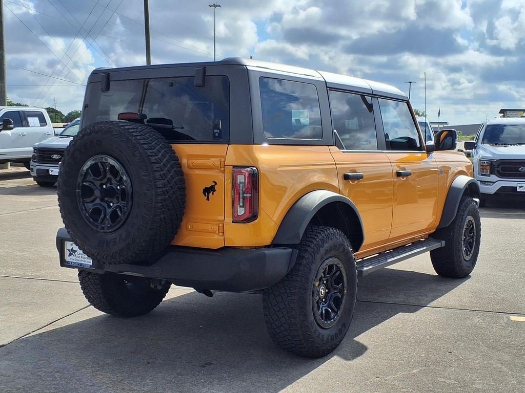 2022 Ford Bronco Wildtrak Orange at AutoSavvy Houston Northwest