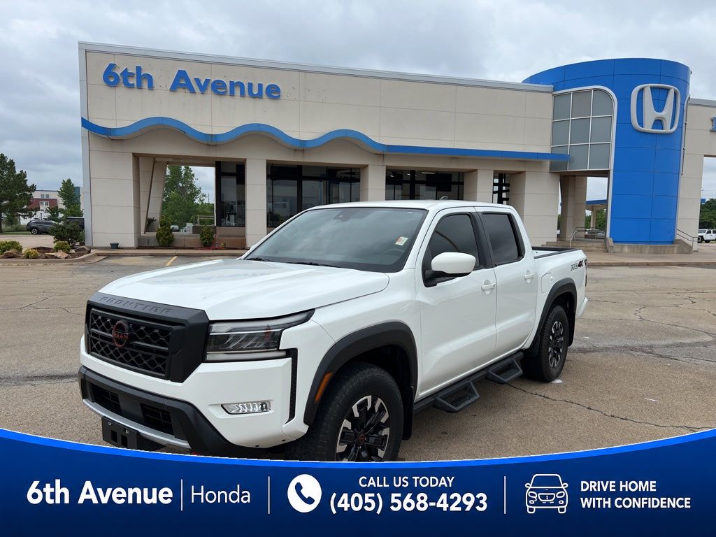 Glacier White 2023 Nissan Frontier Pickup Truck Four-Wheel Drive 9-Speed Automatic