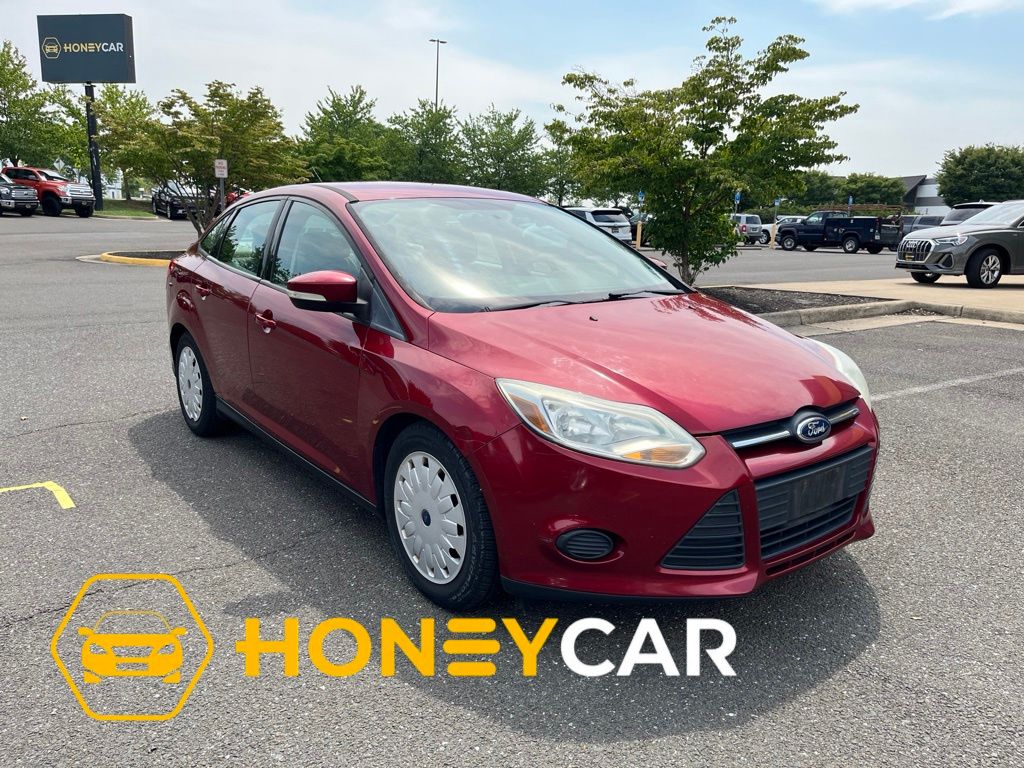 Ruby Red 2014 Ford Focus Sedan Front-Wheel Drive 6-Speed Automatic
