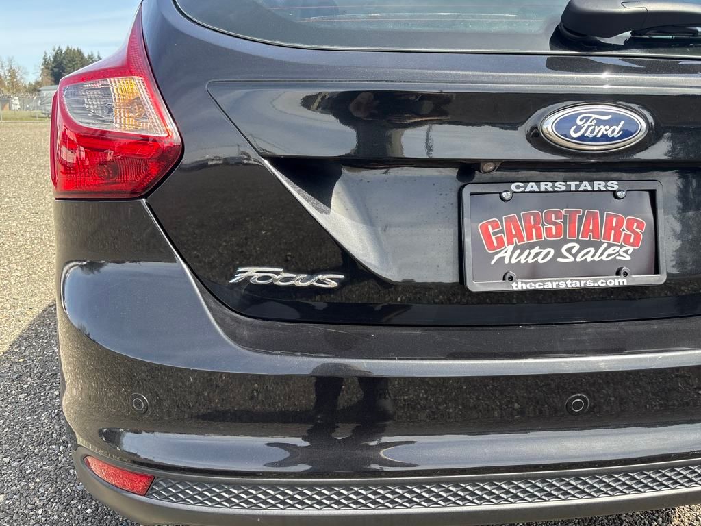 2014 Tuxedo Black Metallic Ford Focus Titanium FWD Hatchback