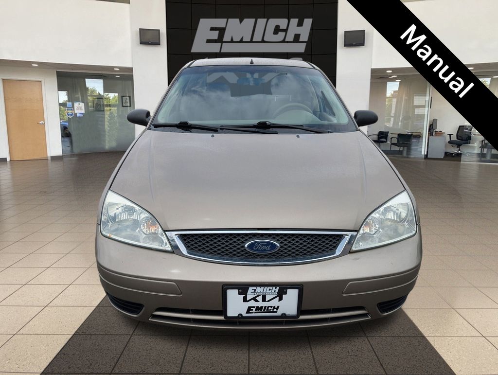Used 2005 Ford Focus ZX4 SE with VIN 1FAFP34N35W133228 for sale in Denver, CO